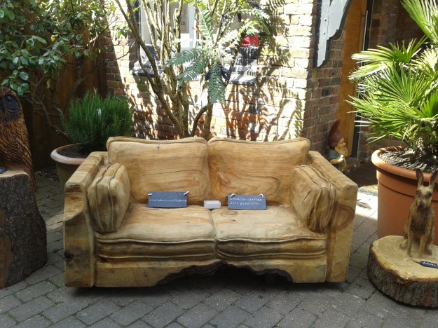 A sofa carved from a whole tree trunk, found in an Arundel shop.  looks comfy, doesn't it?